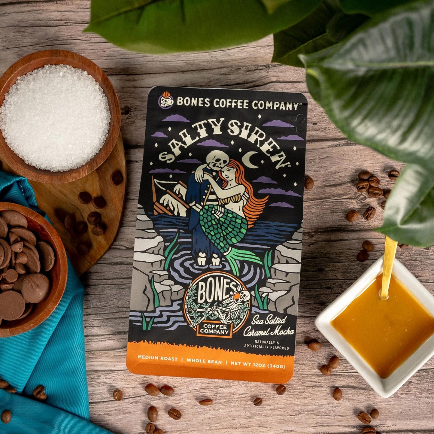 Bones Coffee Company Salty Siren, Sea Salted Caramel Chocolate Flavored Coffee, Medium Roast Low Acid Arabica Beans Compatible with Auto drip and French Press Coffee Maker, 12 Oz Ground