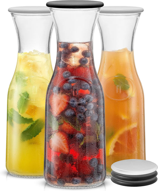 JoyJolt Glass Carafe with Lid, Set of 3 – 1 Liter Glass Pitcher for Mimosa Bar, Water, Iced Tea, Juice, Wine, Lemonade, Milk – Dishwasher Safe Beverage Drink Dispensers for Brunch, Parties